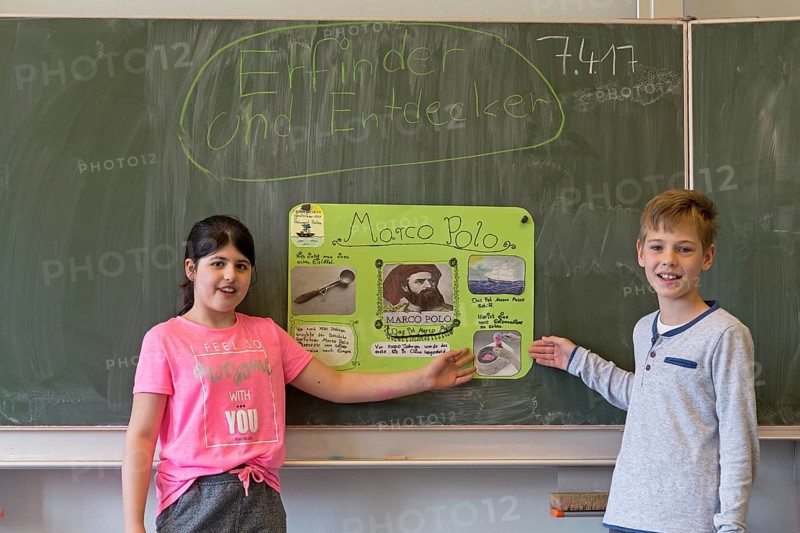 Students giving a presentation about Marco Polo