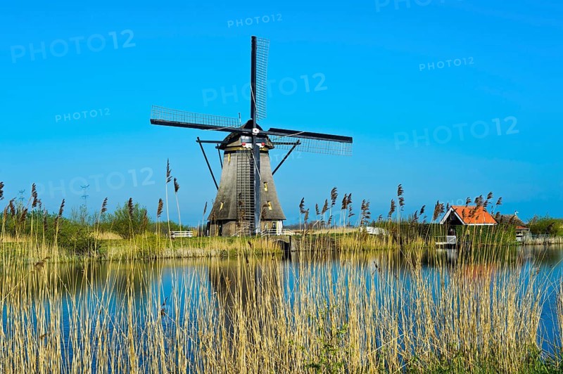 Dutch windmill over a canal