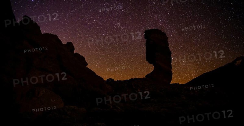 Roque Cinchado and Teide vulcano with starry sky