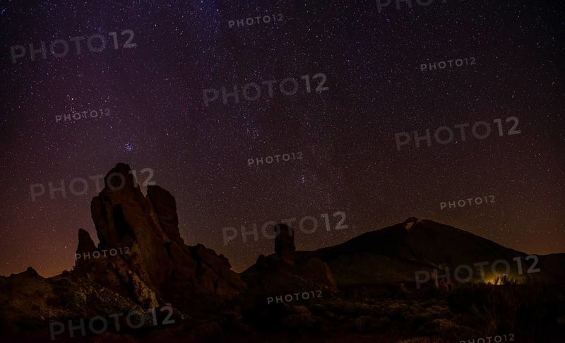 Roque Cinchado and Teide vulcano with starry sky