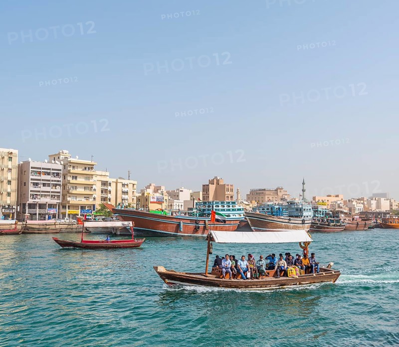 Small traditional ships and old dhow on the creek