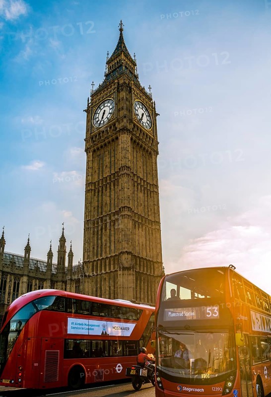 Red double decker bus in front of Big Ben