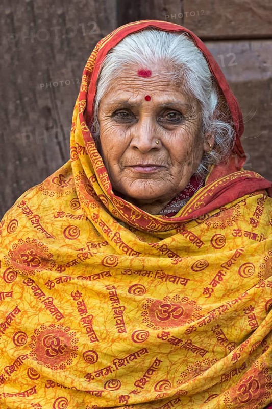 Nepalese woman with nose jewelry and headscarf