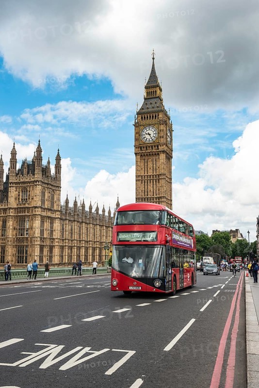 Red double-decker bus on the Westminster Bridge