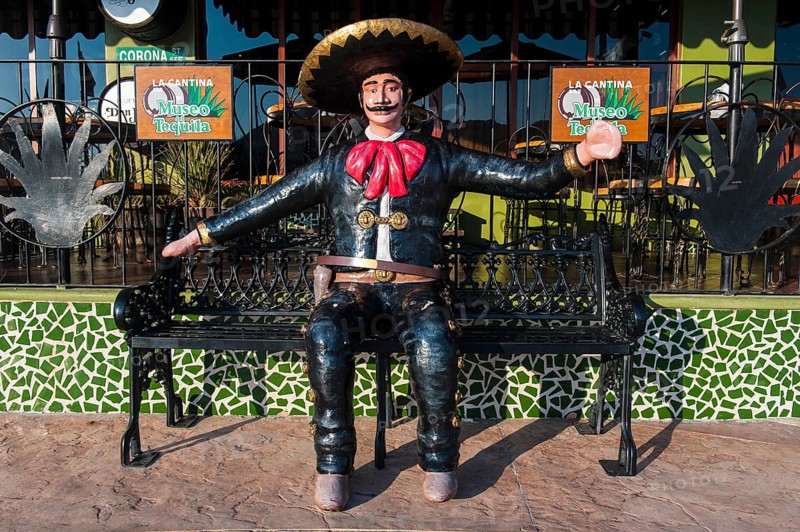 Mexican figure on a bank