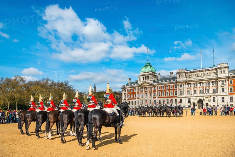 Royal Guards in red uniform on horses