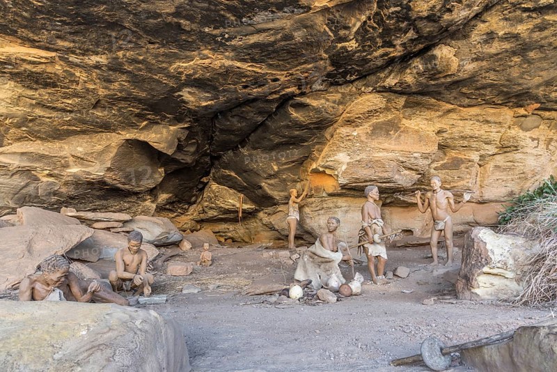 Reconstruction of a San camp with fireplaces in a cave