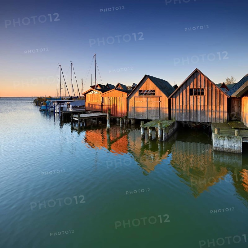 Boat houses in the harbour at Saaler Bodden