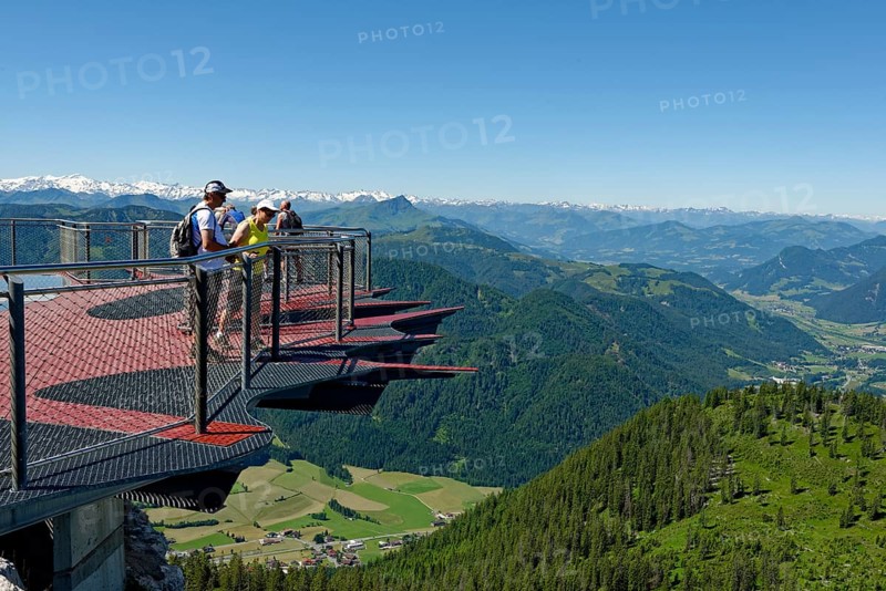Tourists looking over the edge of the viewing platform