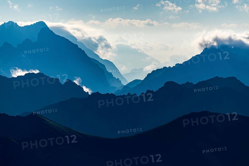Ehrwald mountains in blue morning mist