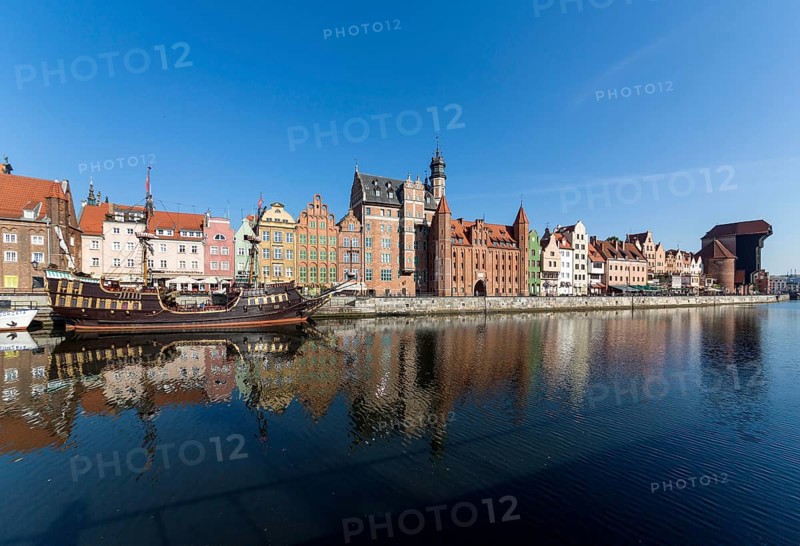 Row of houses in historic centre with ship