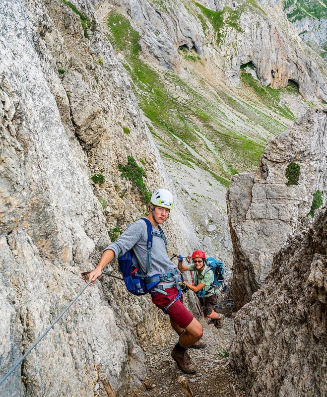 Hikers on via ferrata