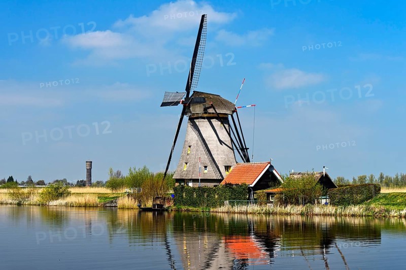 Dutch windmill over a canal