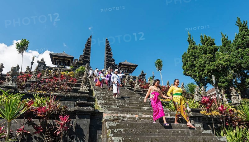 Devout Balinese descend stairs