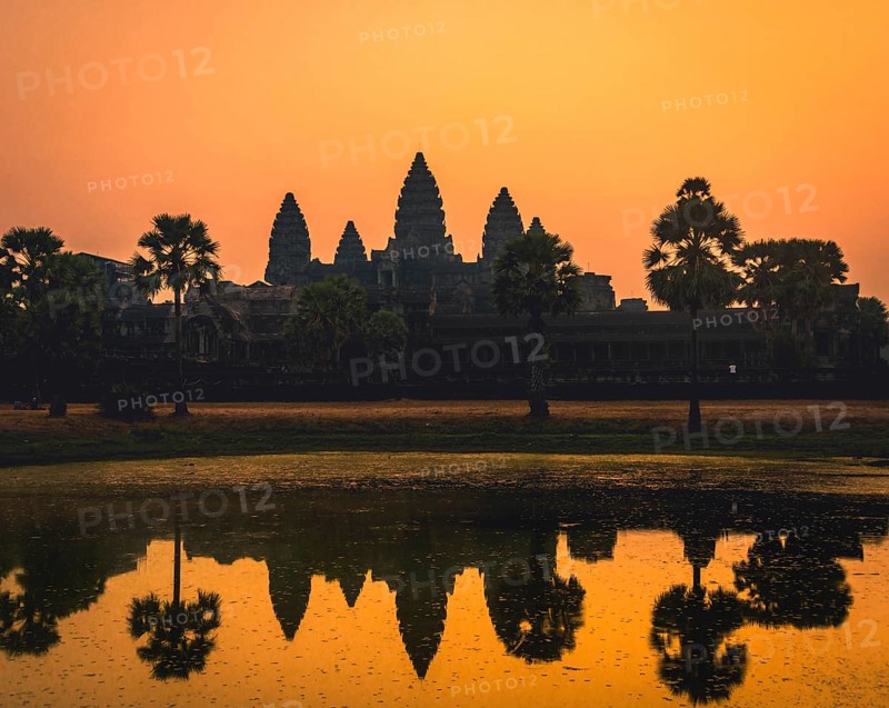 Temple complex of Angkor Wat reflected in the water basin