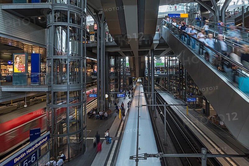Basement escalator and glass elevator for long-distance and regional traffic