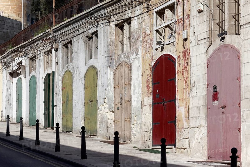Old warehouse with colorful doors at Barriera Wharf