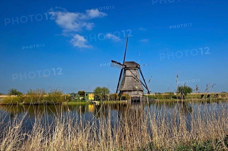 Dutch windmill over a canal