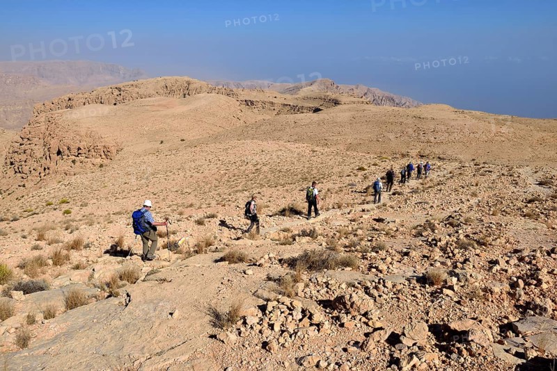 Tourists hiking above Wadi Tiwi
