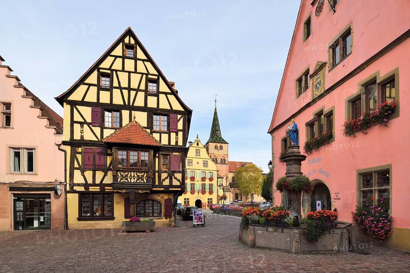 Old town with fountain and church Church of St. Anna