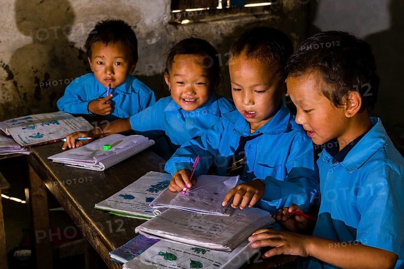 Children in blue dresses
