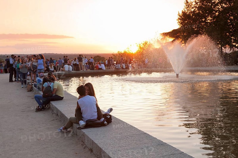 People enjoying the sunset at Debod Temple