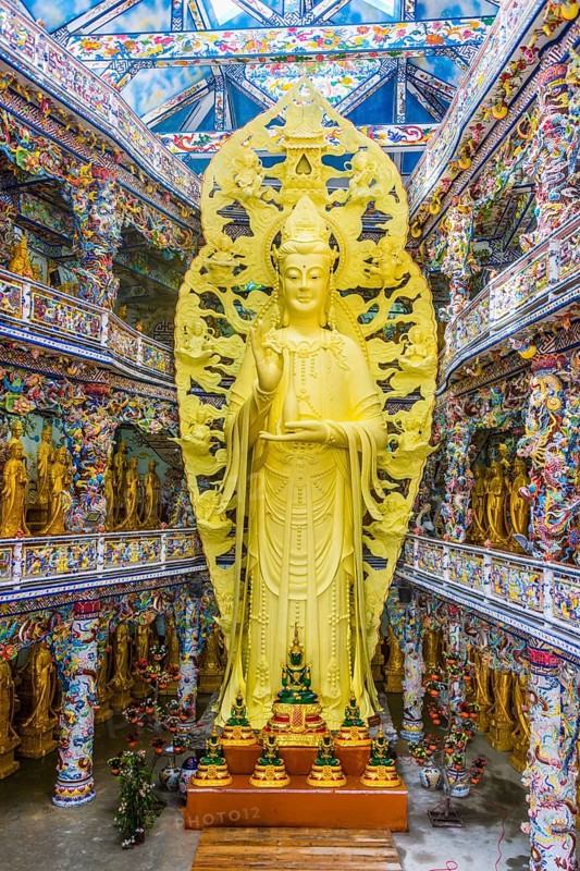 Giant golden standing Buddha