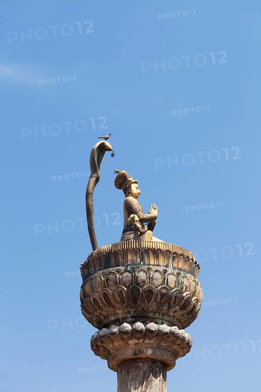 Statue of king Yoganarendra Malla with snake and bird