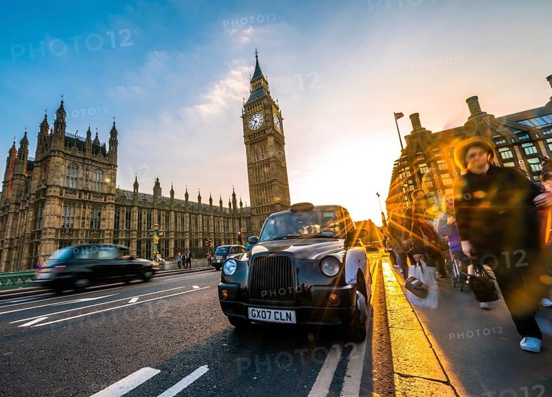 Black taxi in front of Big Ben