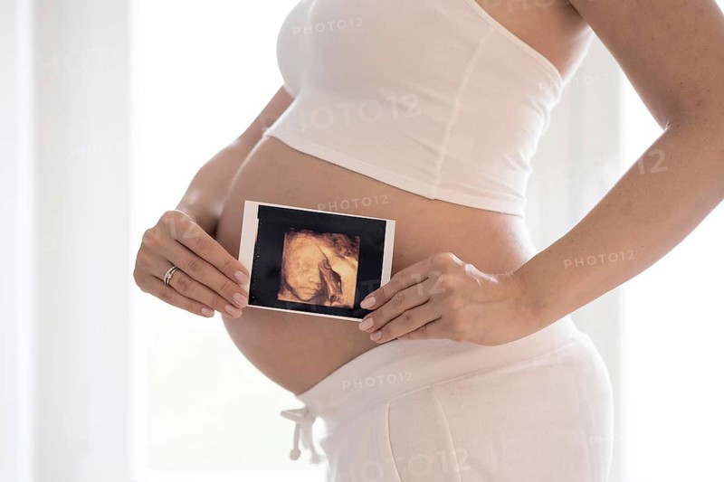 Woman in her ninth month pregnant