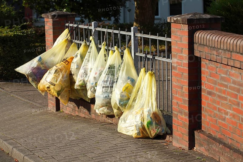 Yellow bags with plastic waste