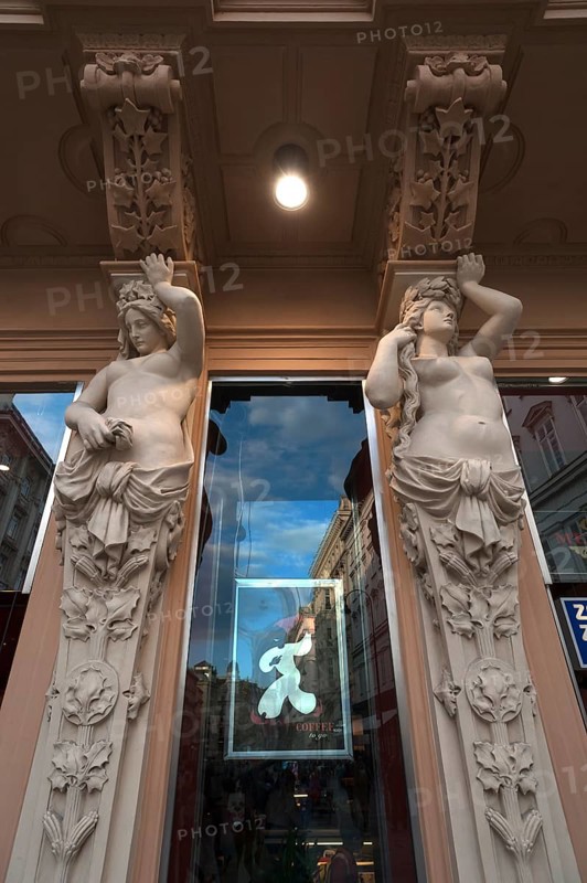Caryatids on building front