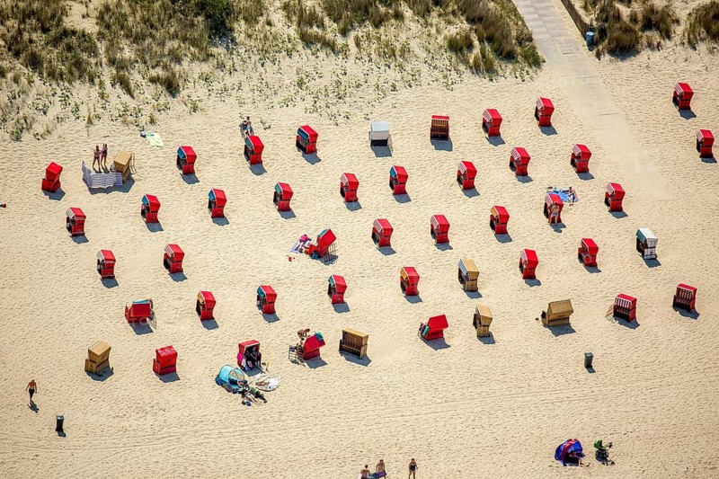 Red beach chairs on the beach