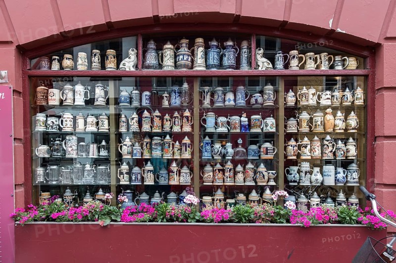 Collection of steins in window of restaurant Kobenhavneren in Helsingor