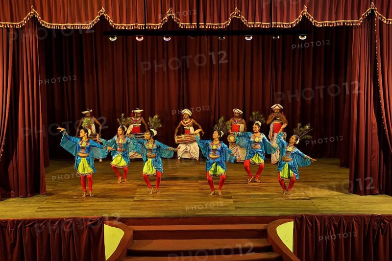 Drummers and dancers at a performance of Kandy dancers