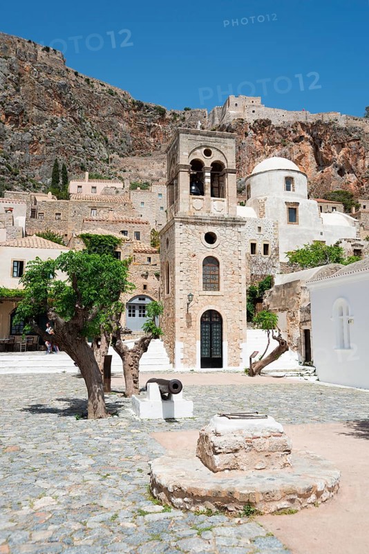 Main square with bell tower of the Byzantine Greek Orthodox church Christos Elkomenos