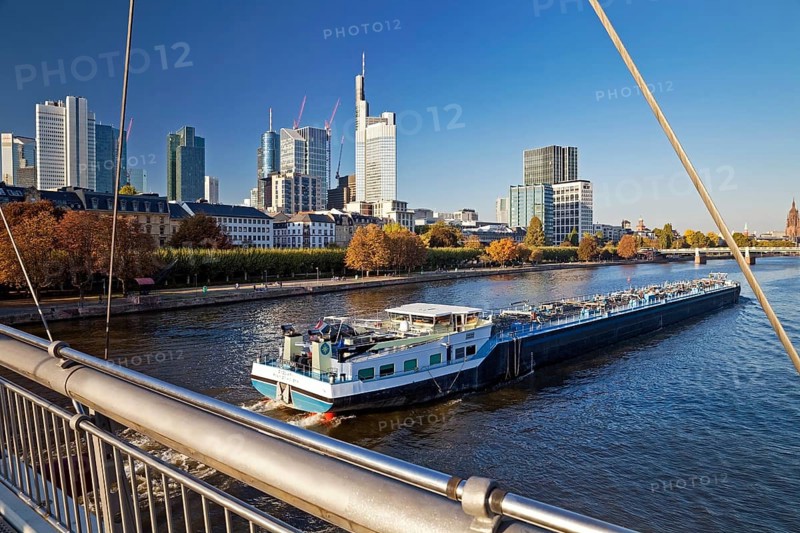 City view from Holbeinsteg with transport ship on the Main and the banking district in the background