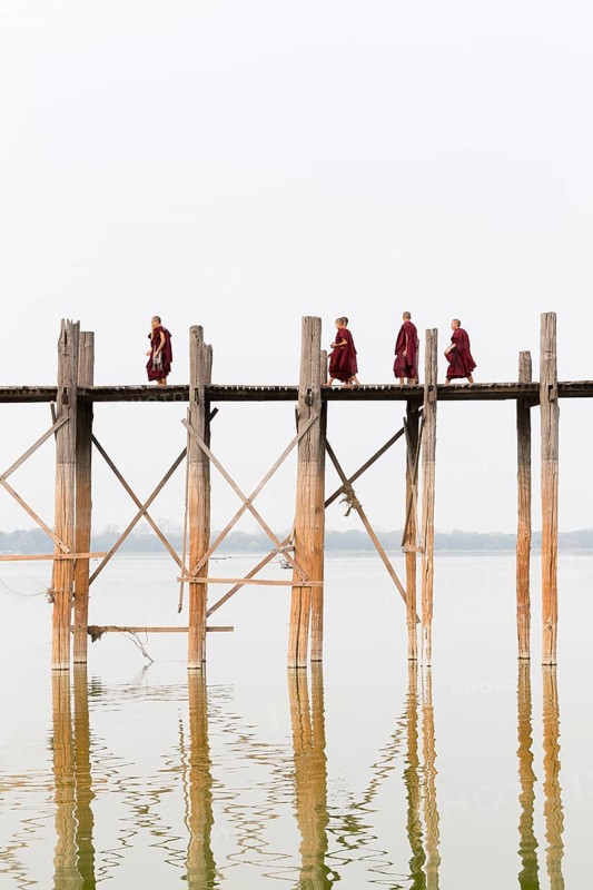 Monks crossing U Bein bridge