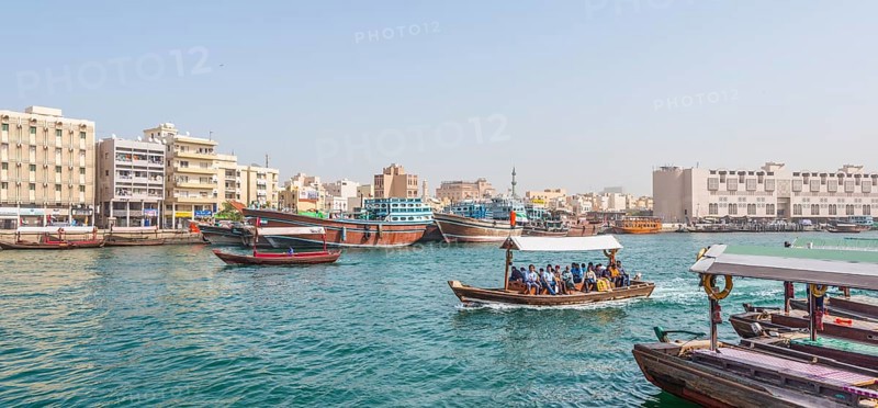 Small traditional ships and old dhow on the creek