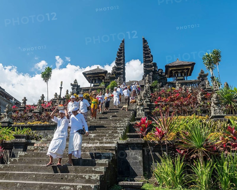 Devout Balinese descend stairs