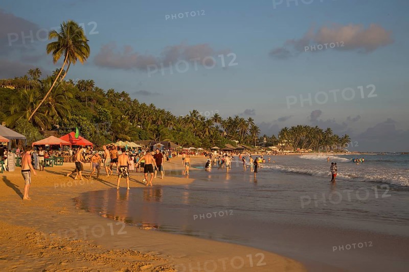 Crowded sandy beach at Mirissa