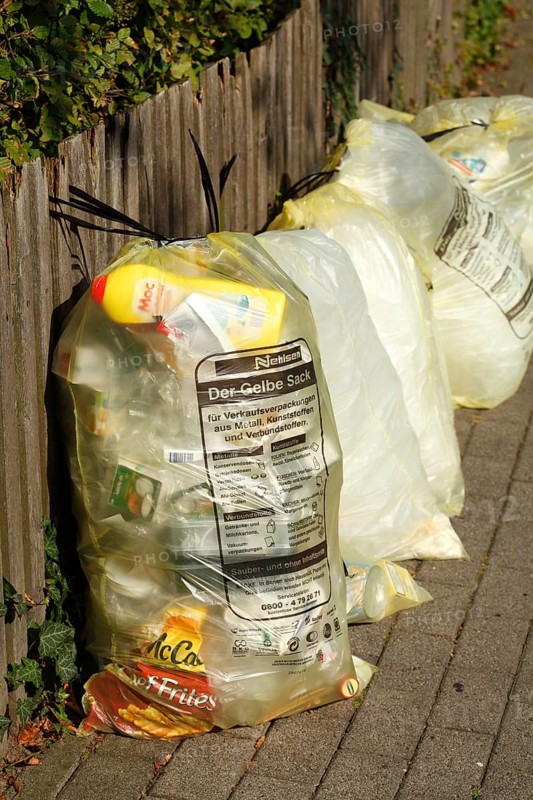 Yellow bags with plastic waste