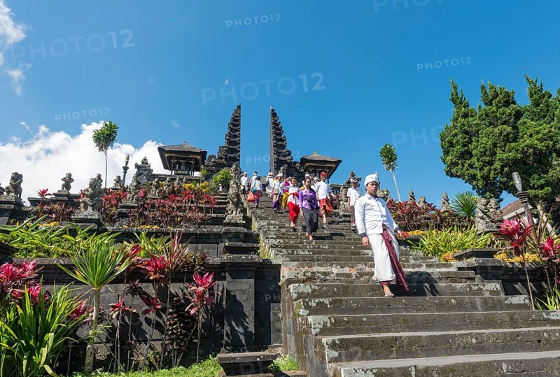 Devout Balinese descend stairs