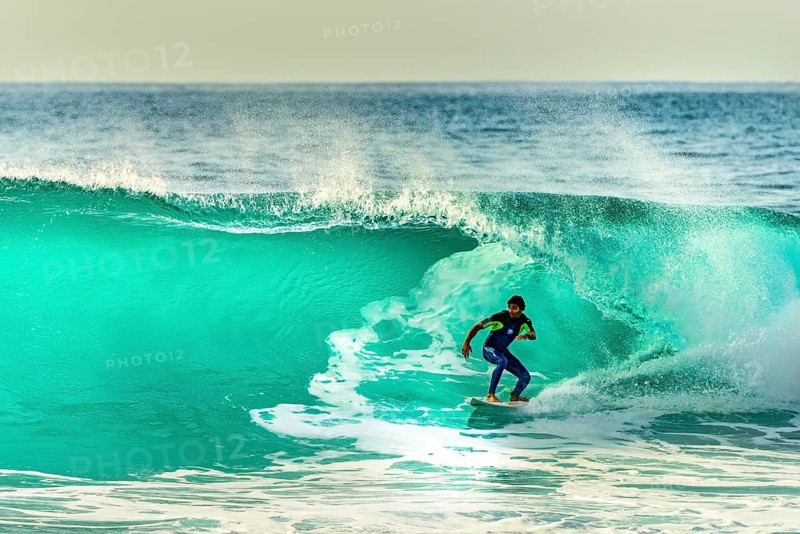 Surfer with large wave