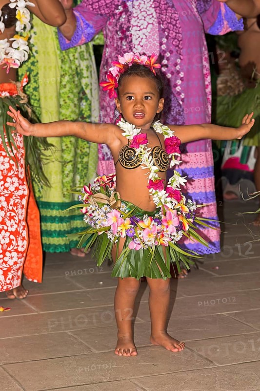 Little girl decorated with flowers