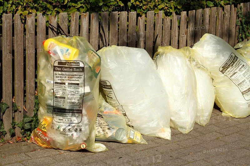 Yellow bags with plastic waste