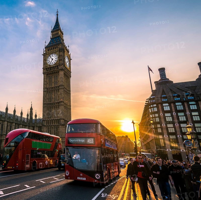 Red double decker bus in front of Big Ben