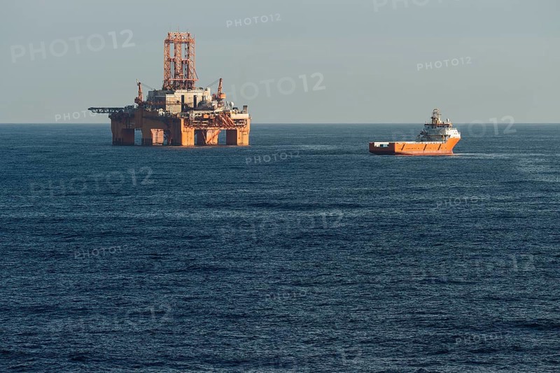 Supply vessel Normand Aurora next to West Phoenix oil rig