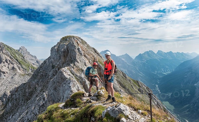 Two female hikers on trail
