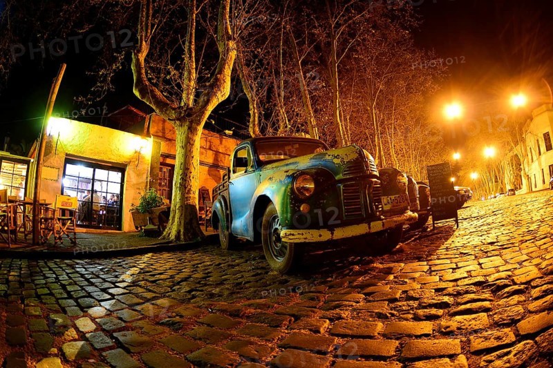 Oldtimer cars on cobblestone street